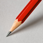 czerwony ołówek dotykający kartki papieru